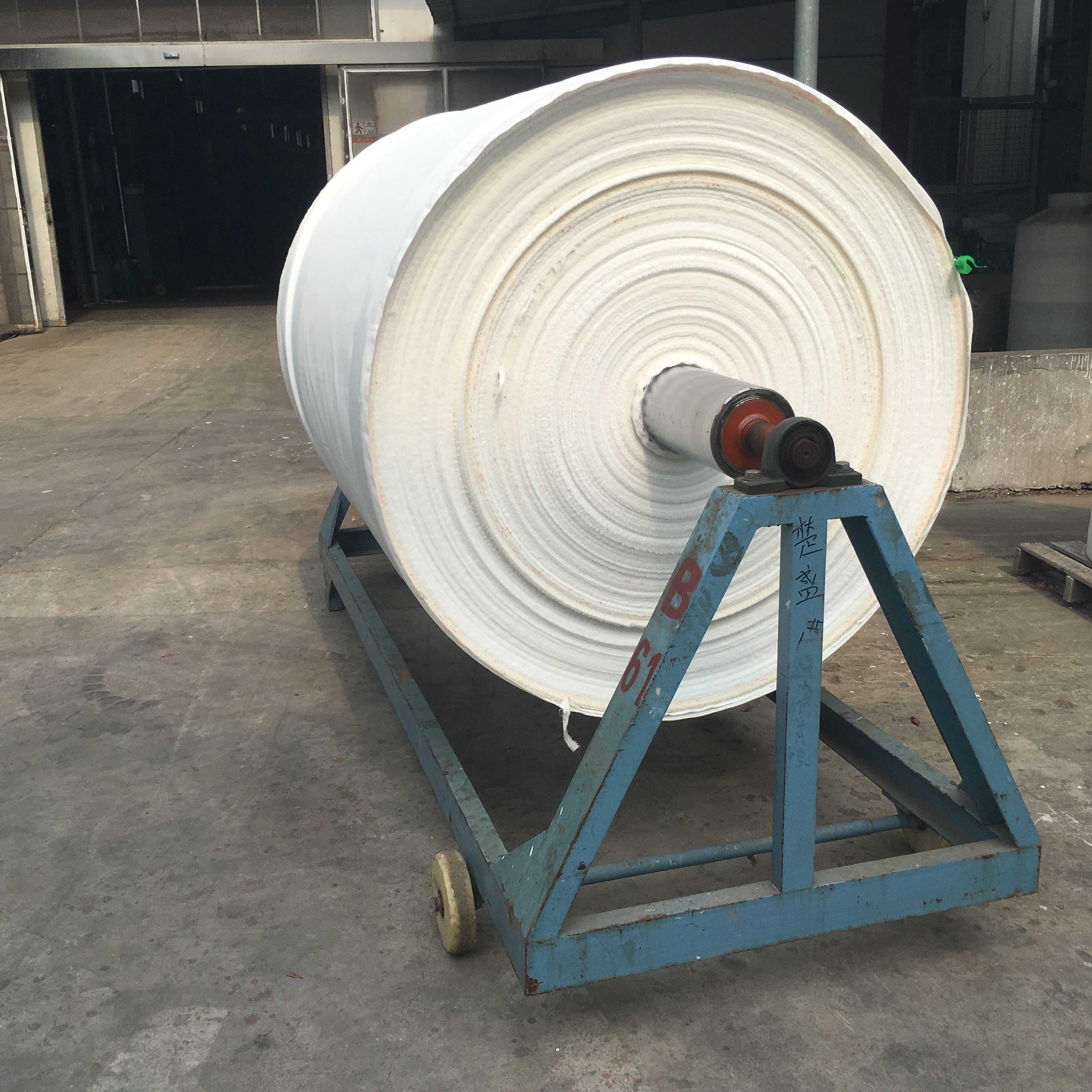 Large printable canvas master roll used for bulk production at Colors Art factory
