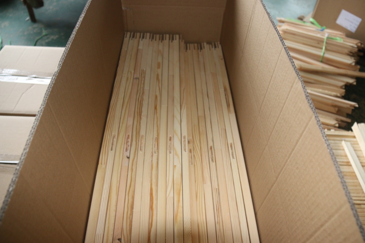 Finished wooden stretcher bars packed in a carton for shipment